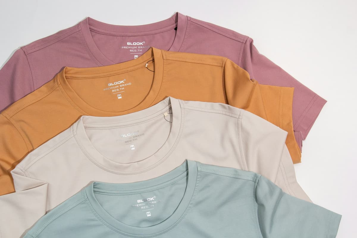 DTF & Apparel Printing — Direct-to-Film printing puts photographic detail and solid colour onto cotton, polyester and blends without the setup cost of screens.